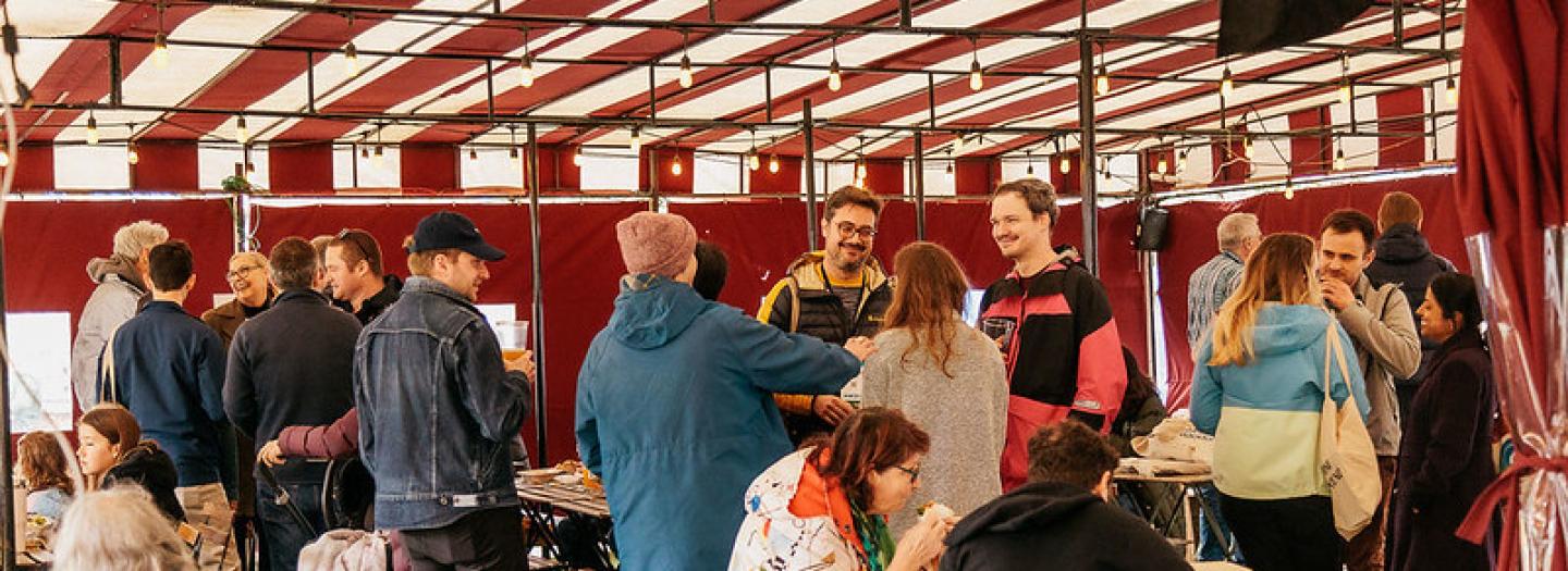 UCSF community members in conversation over food and drink